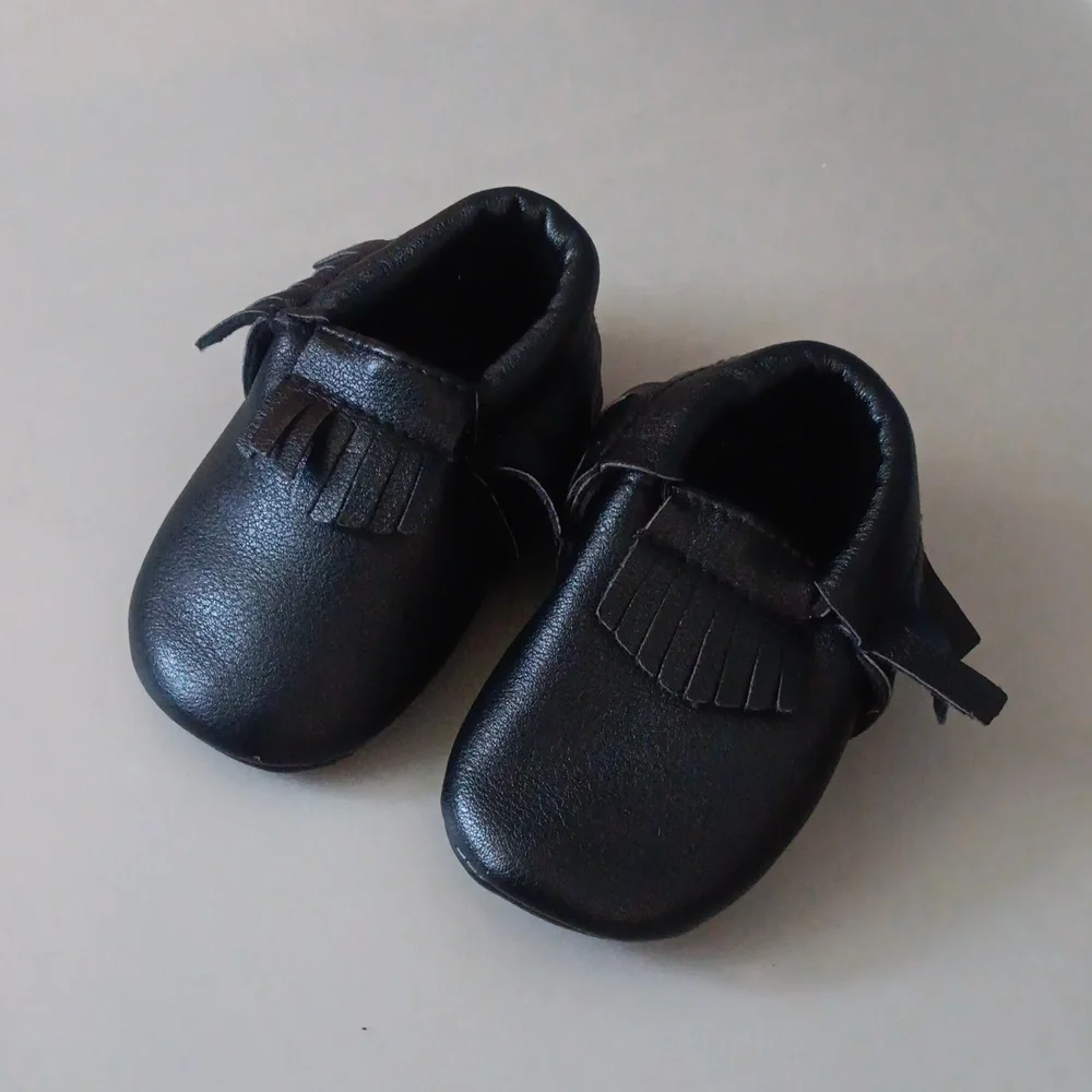Black leather moccasins